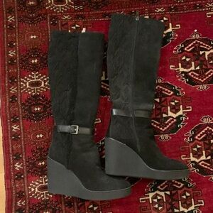 Aquatalia black boots. Soft interior, narrow fit